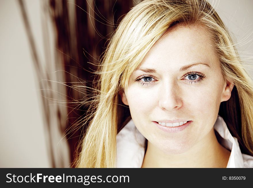 Young blond model looking into the camera