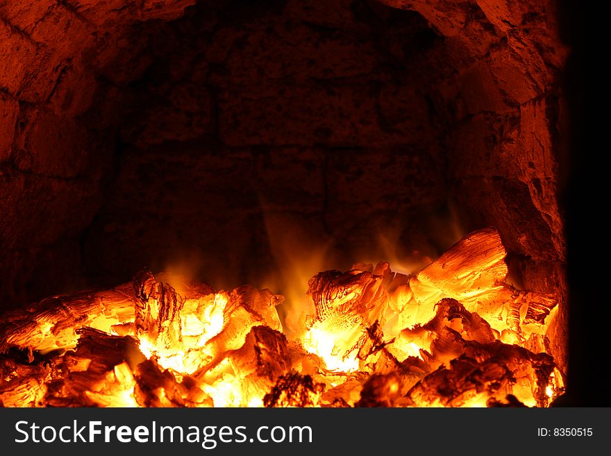 Traditional russian stove with firewood fuel