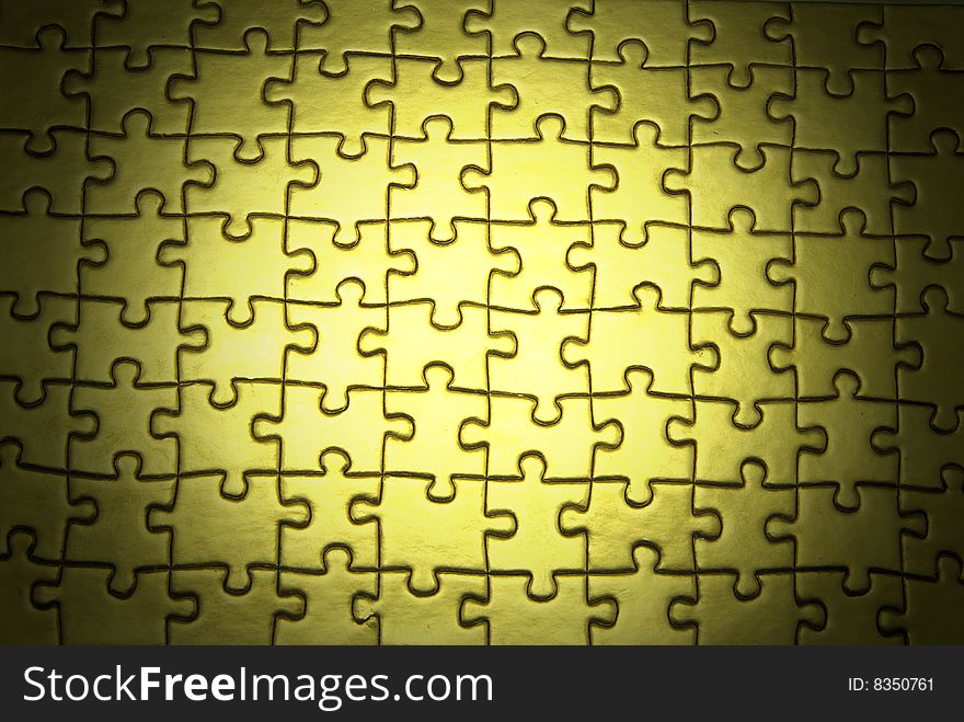 Background of gold jigsaw puzzle