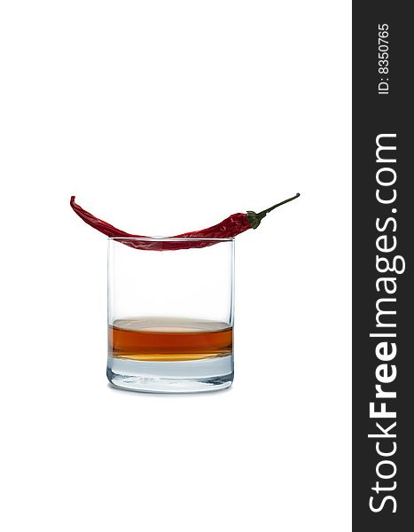 Red pepper and pepper tincture on a white background