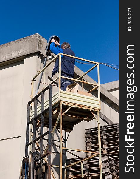 Man at work in industrial site of an industry