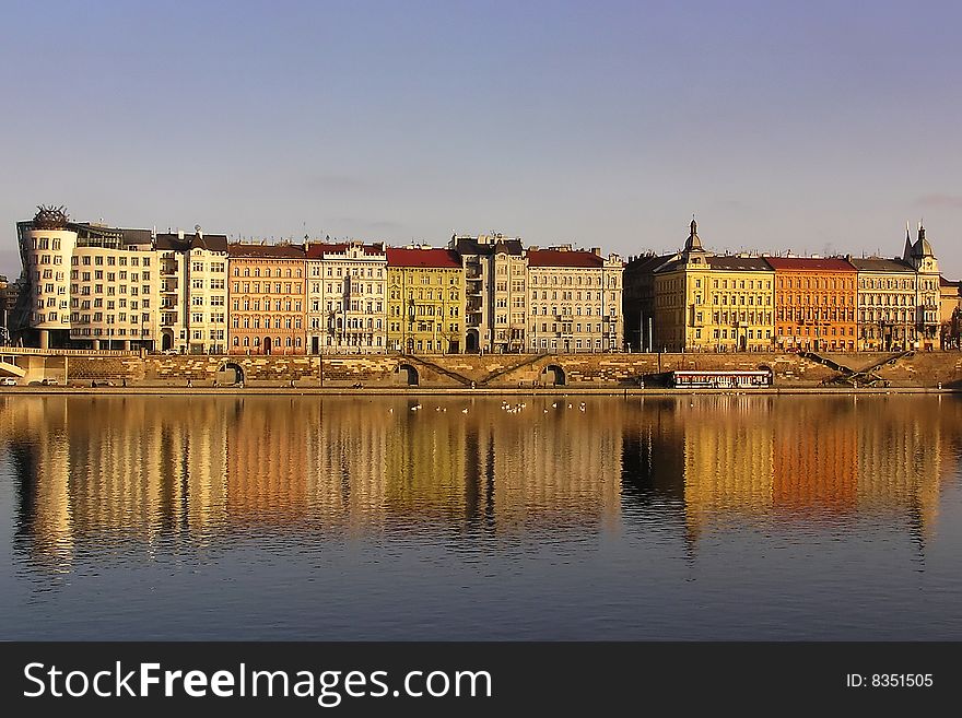 Pragues Riverbank In Sunset