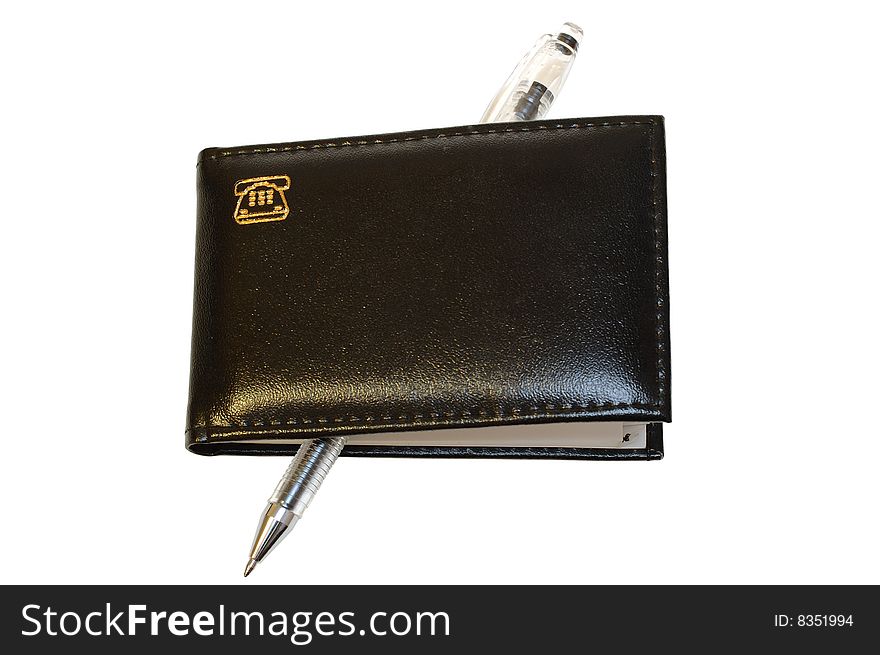 Black notebook (organizer) with leather cover and jell pen on isolated background. Black notebook (organizer) with leather cover and jell pen on isolated background.