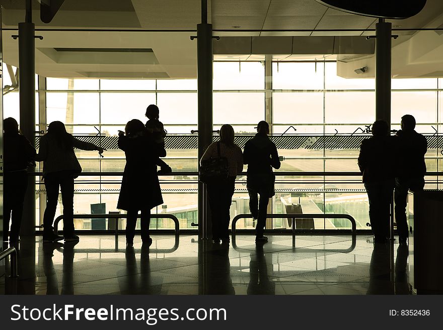 People waiting in the airport. People waiting in the airport