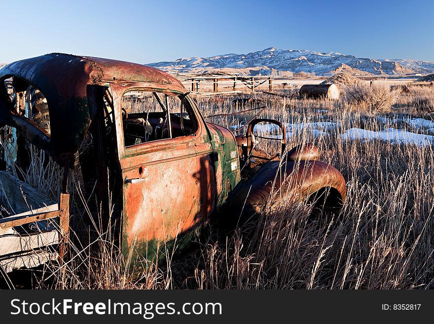 Vintage car abandoned in a field, rural Wyoming