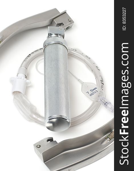 Laryngoscope and intubation tube, isolated on a white background