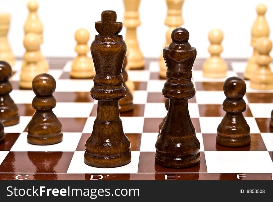 A chess is black and white on a white background. A chess is black and white on a white background