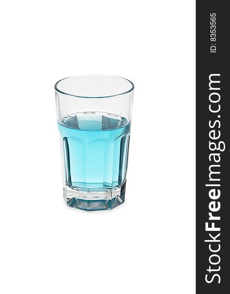 Glass full of blue liquid