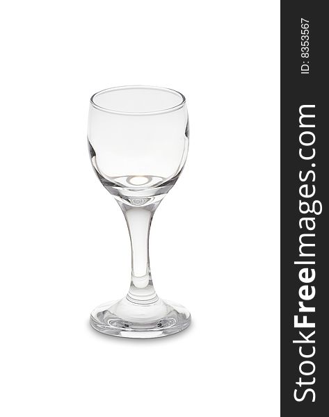 An empty small drinking glass