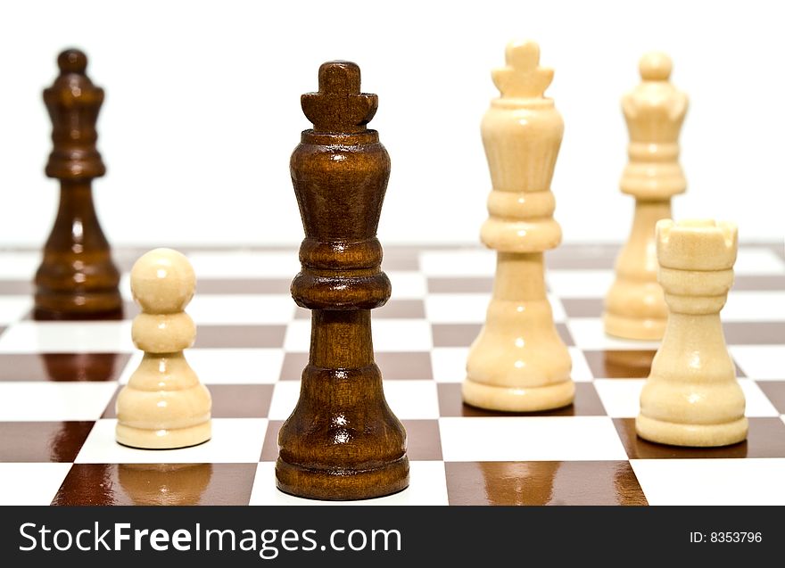 A chess is black and white on a white background. A chess is black and white on a white background