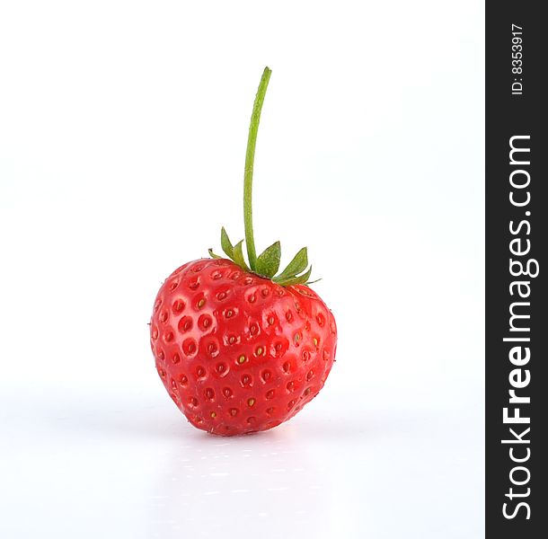 Close up of a strawberry. Isolated over white background