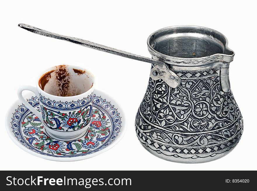 Antique coffeepot and coffee cup on a white background isolated