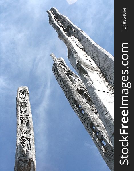 Three hand made beautiful wood sculptures on the top of a hill in Romania, Europe. . Three hand made beautiful wood sculptures on the top of a hill in Romania, Europe.