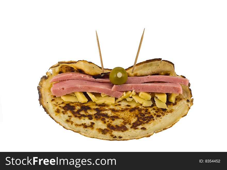Pancake with cheese, a ham and an olive, isolated on white. Pancake with cheese, a ham and an olive, isolated on white.