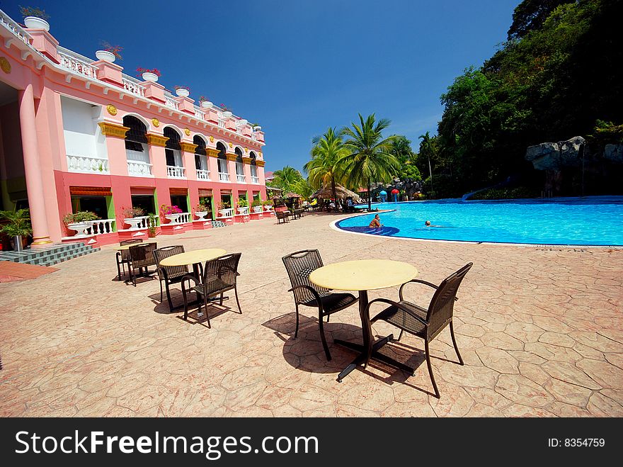 Beautiful swiming pool image on the blue sky background. Beautiful swiming pool image on the blue sky background