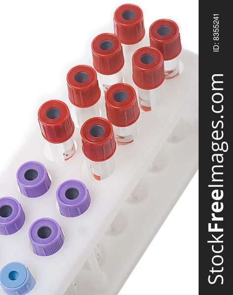 Multi-coloured test tubes isolated on the white