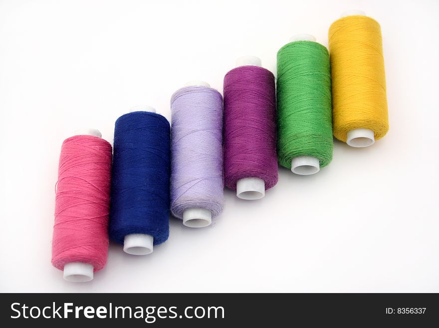 The Varicoloured set spool.The Threads sewing. The Varicoloured set spool.The Threads sewing.