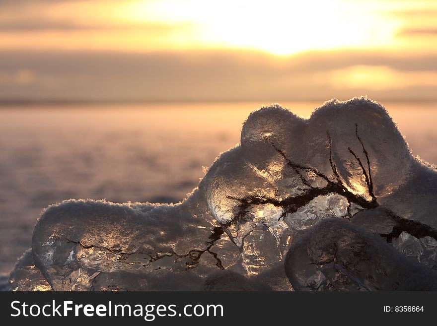 Sunset Over Frozen Lake