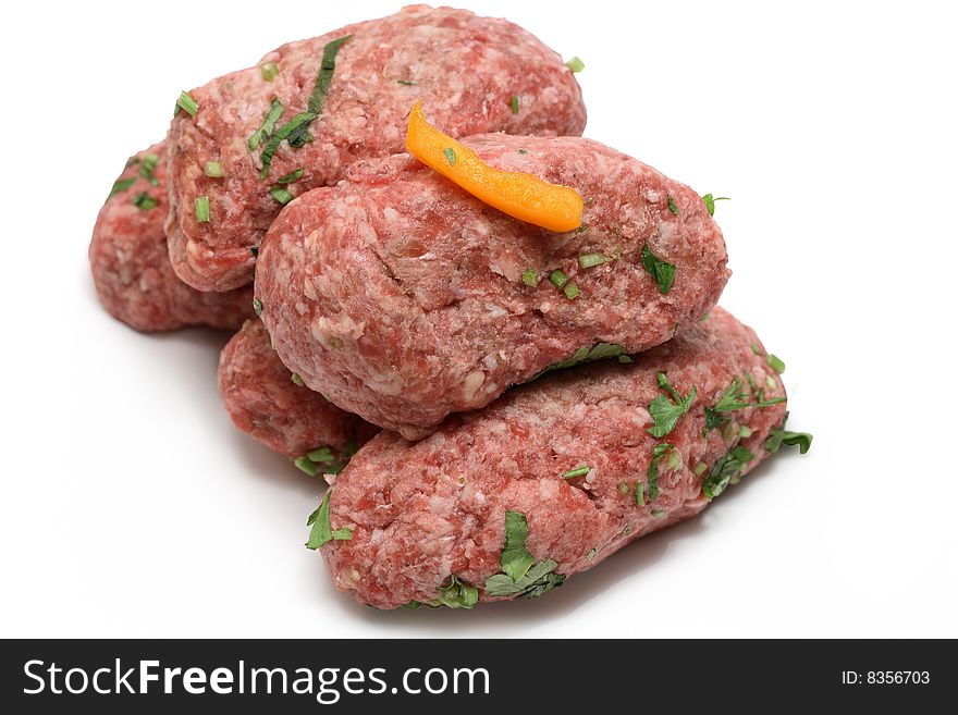 Raw meat rissoles isolated on white background