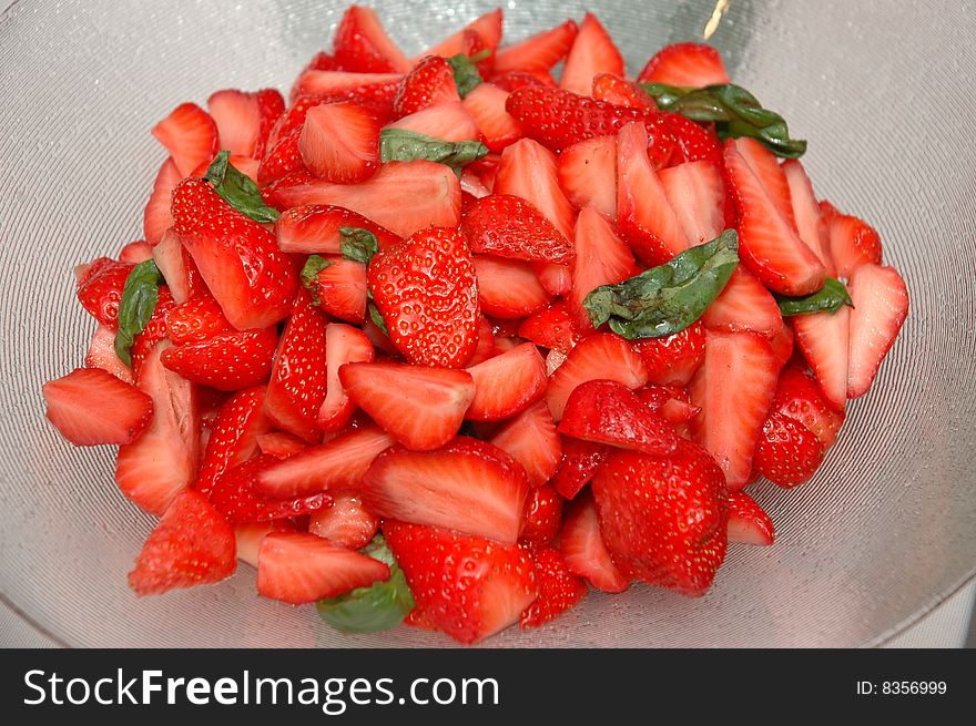 Plate of cut fresh strawberries. Plate of cut fresh strawberries