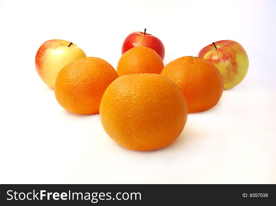 Four Mandarines And Three Apples