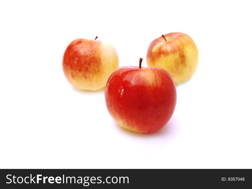 Three red apples on a white background. Three red apples on a white background