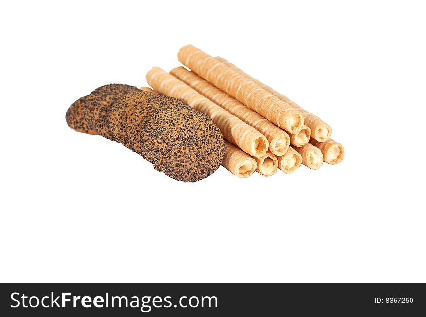 Tasty cookie with seeds of poppy isolated on a white background. Tasty cookie with seeds of poppy isolated on a white background.