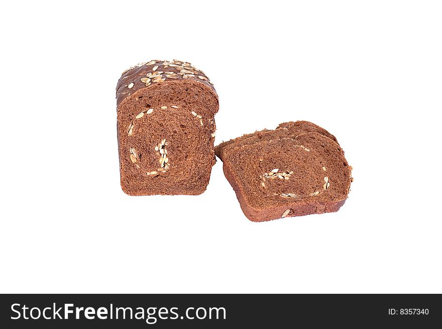 Rye bread full of seeds isolated on a white background. Rye bread full of seeds isolated on a white background.