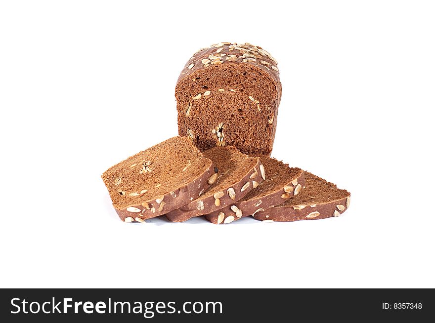 Bread full of seeds isolated on a white background. Bread full of seeds isolated on a white background.