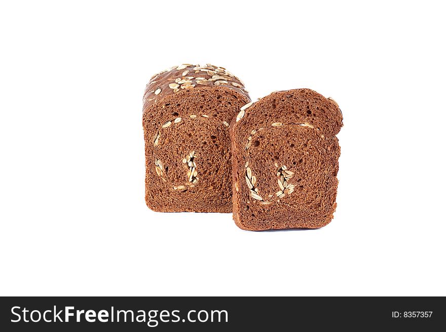 Rye Bread Full Of Seeds On A White Background.