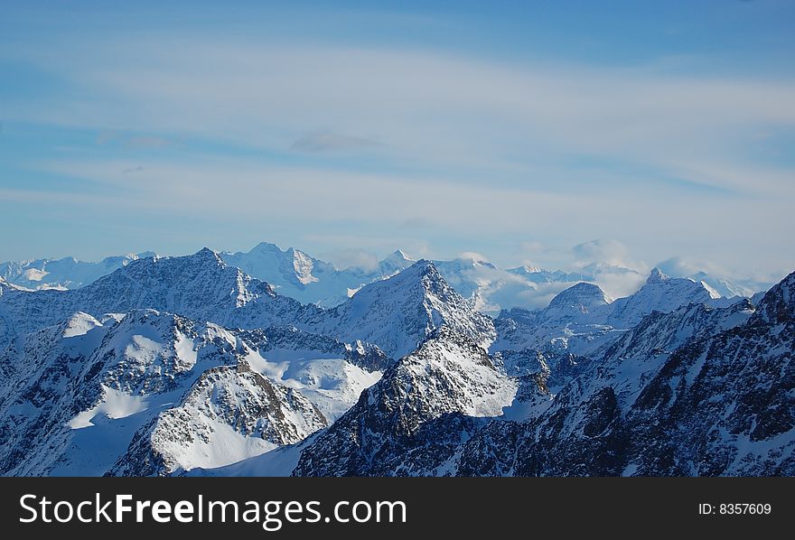 Alps peaks through clouds in Austria. Alps peaks through clouds in Austria