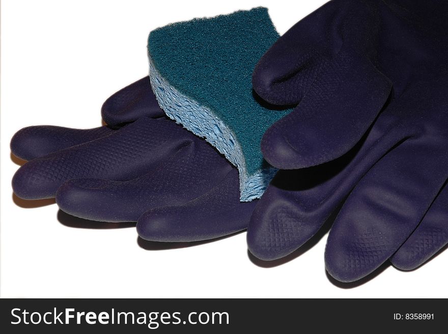 Purple rubber gloves, and a sponge scour pad. Purple rubber gloves, and a sponge scour pad
