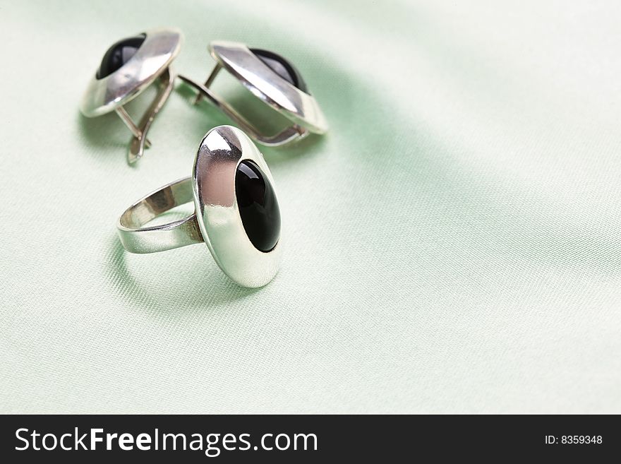 Silver decoration: ring and ear-ring, accessories for woman