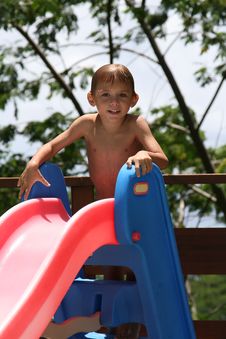 Boy On A Water Slide Royalty Free Stock Image Boy On A Water Slide Royalty Free Stock Image