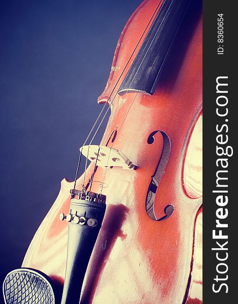 Violin details with blue background