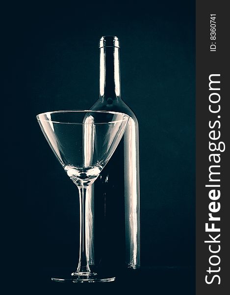 Modern arangement of wine bottle, and glass. Modern arangement of wine bottle, and glass.