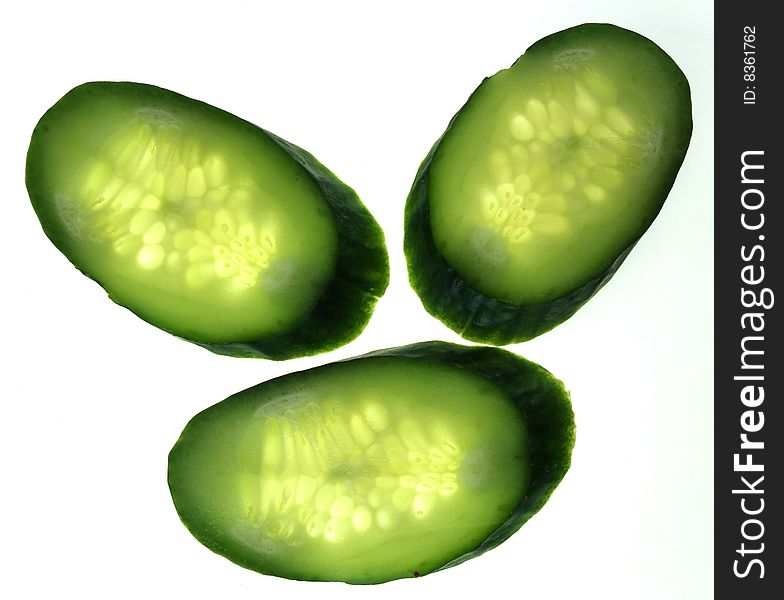 Slices of cucumber on a white background