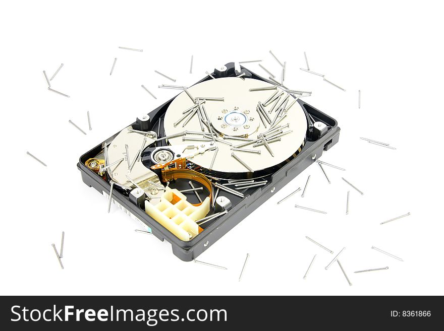 Opened Hard drive lying on the white background with drill, front view. Opened Hard drive lying on the white background with drill, front view