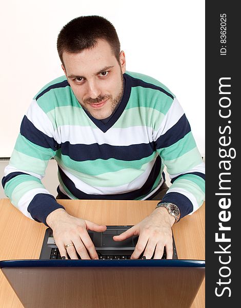 Young man working with his notebook. Young man working with his notebook