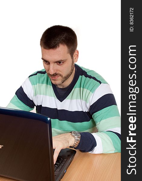 Young man working with his notebook. Young man working with his notebook