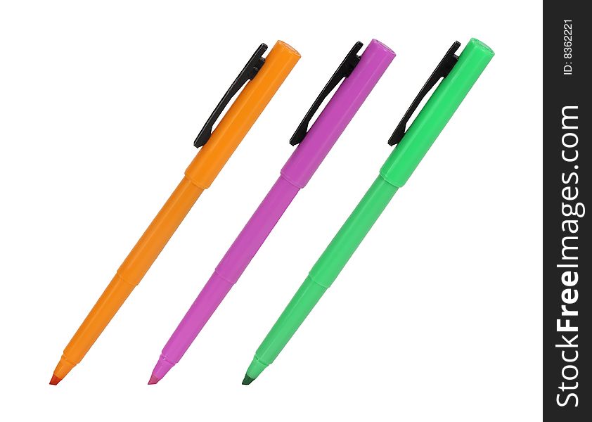 Three highlighter pens isolated on a white background. Three highlighter pens isolated on a white background