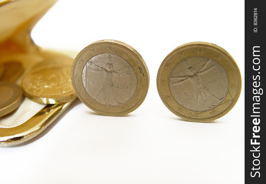 Two coins rolling into a purse. Two coins rolling into a purse