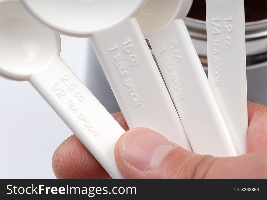 A set of tea spoons in hand. A set of tea spoons in hand