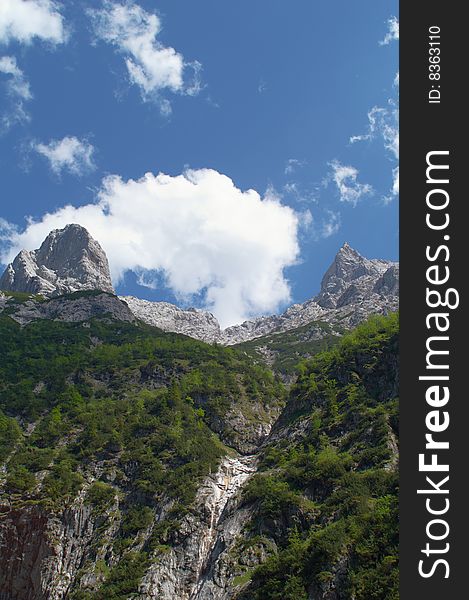 Scenery shot in Alpine mountains, two peaks and cloud. Scenery shot in Alpine mountains, two peaks and cloud