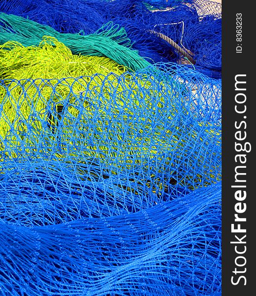 Colorful heap of fishing nets. Colorful heap of fishing nets