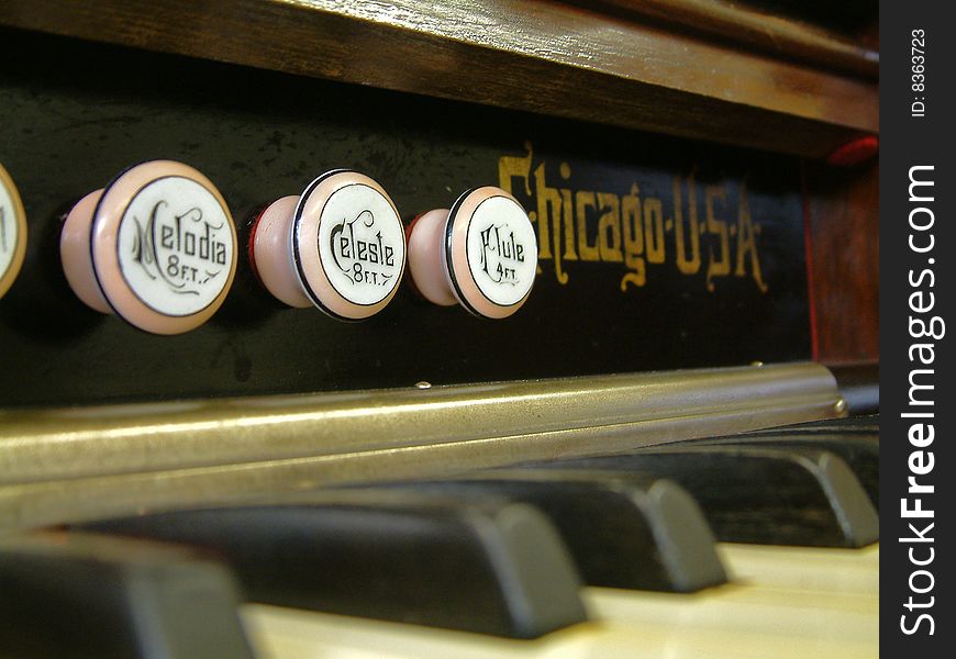 Close up of reed organ stops. Close up of reed organ stops