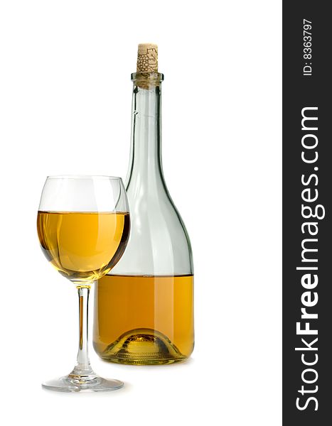 Glass and bottle of excellent white wine on a white background