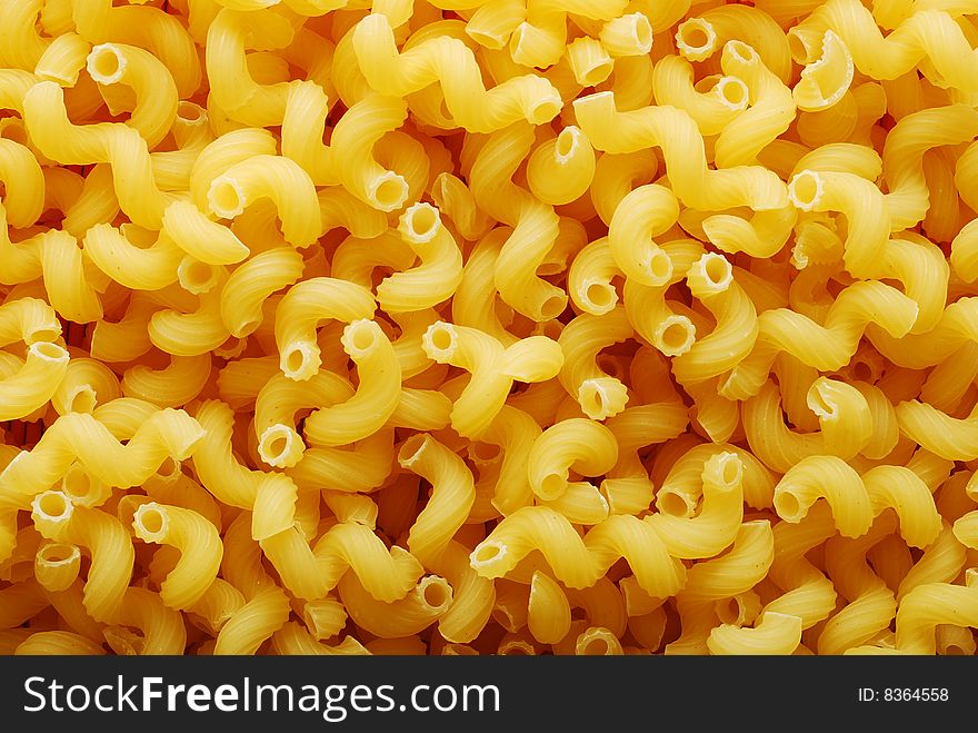 Yellow fresh pasta background texture