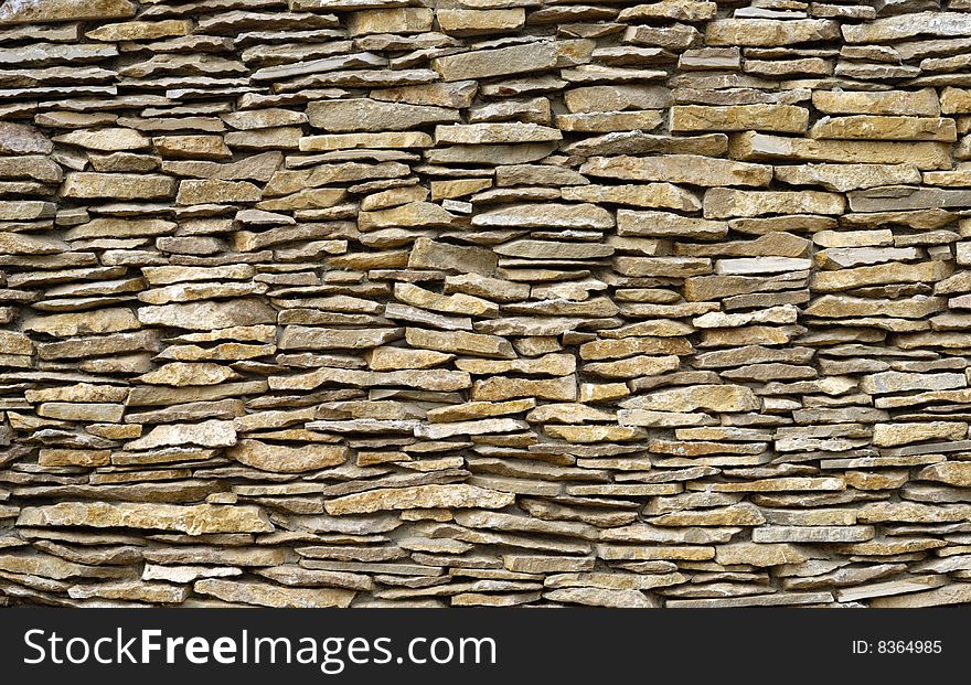 Fragment of artistic wall made with multiple stones. Fragment of artistic wall made with multiple stones