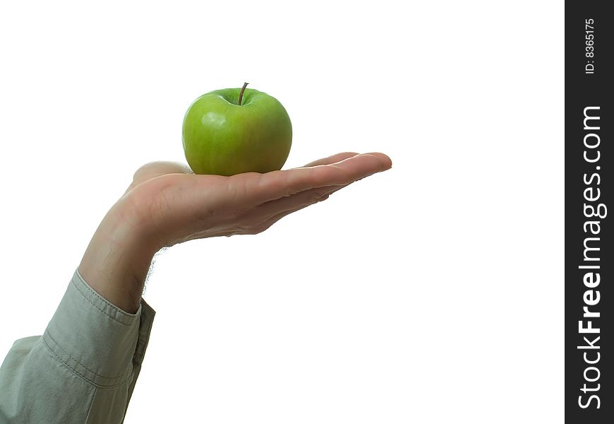 Isolated green apple in hand on white background.